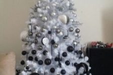 13 a white Christmas tree with styling from silver to black
