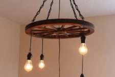 15 a vintage industrial chandelier of chain, a wheel and bulbs for a vintage space