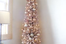 16 dusty pink sparkly Christmas tree with metallic ornaments looks shiny