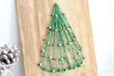 DIY string art Christmas tree in green
