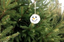 DIY snowman wood slice ornaments