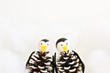 DIY penguin ornaments with pinecones