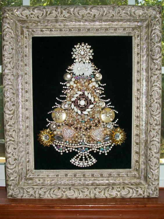 a beautiful old jewelry Christmas tree art in a vintage frame
