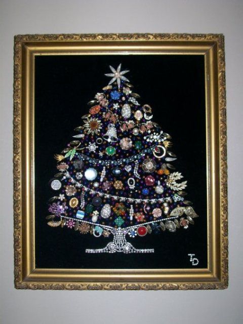 a huge jewelry Christmas tree in different colors with monograms in the corner