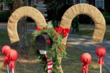 06 oversized candy canes wrapped with burlap is a cute idea