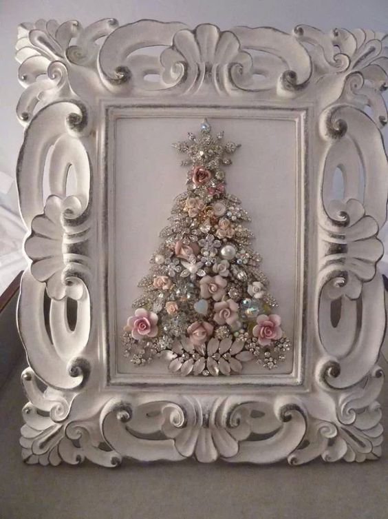 a vintage jewelry and beads Christmas tree in a white shabby chic frame