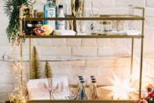 10 decorate the cart with lights, a shining star and some greenery for an effortlessly chic touch