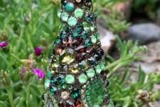 11 a bold jewelry Christmas cone tree in various shades of green