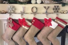 11 burlap stockings with bows and buttons will be a nice rustic idea
