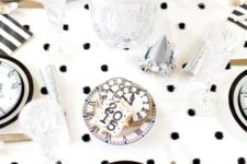 22 a fun fur polka dot tablecloth, some silver touches and clocks for decor are all you need for New Year