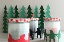 DIY holiday lantern with paper men garlands