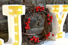 DIY holiday marquee sign wit a wreath