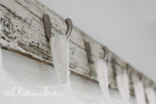 DIY reclaimed wood curtain rods with hooks