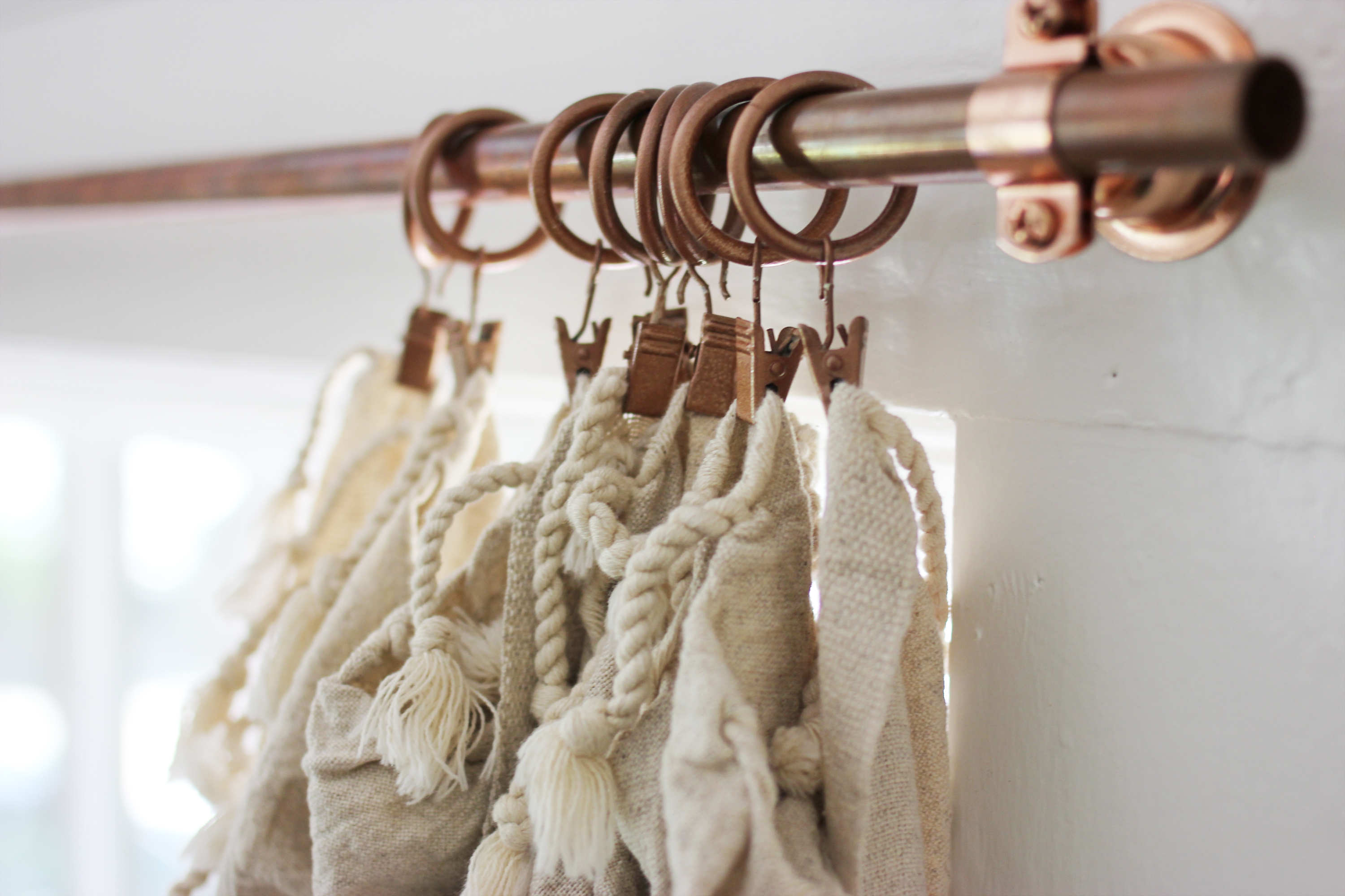 DIY affordable copper curtain rods (via www.apartmenttherapy.com)