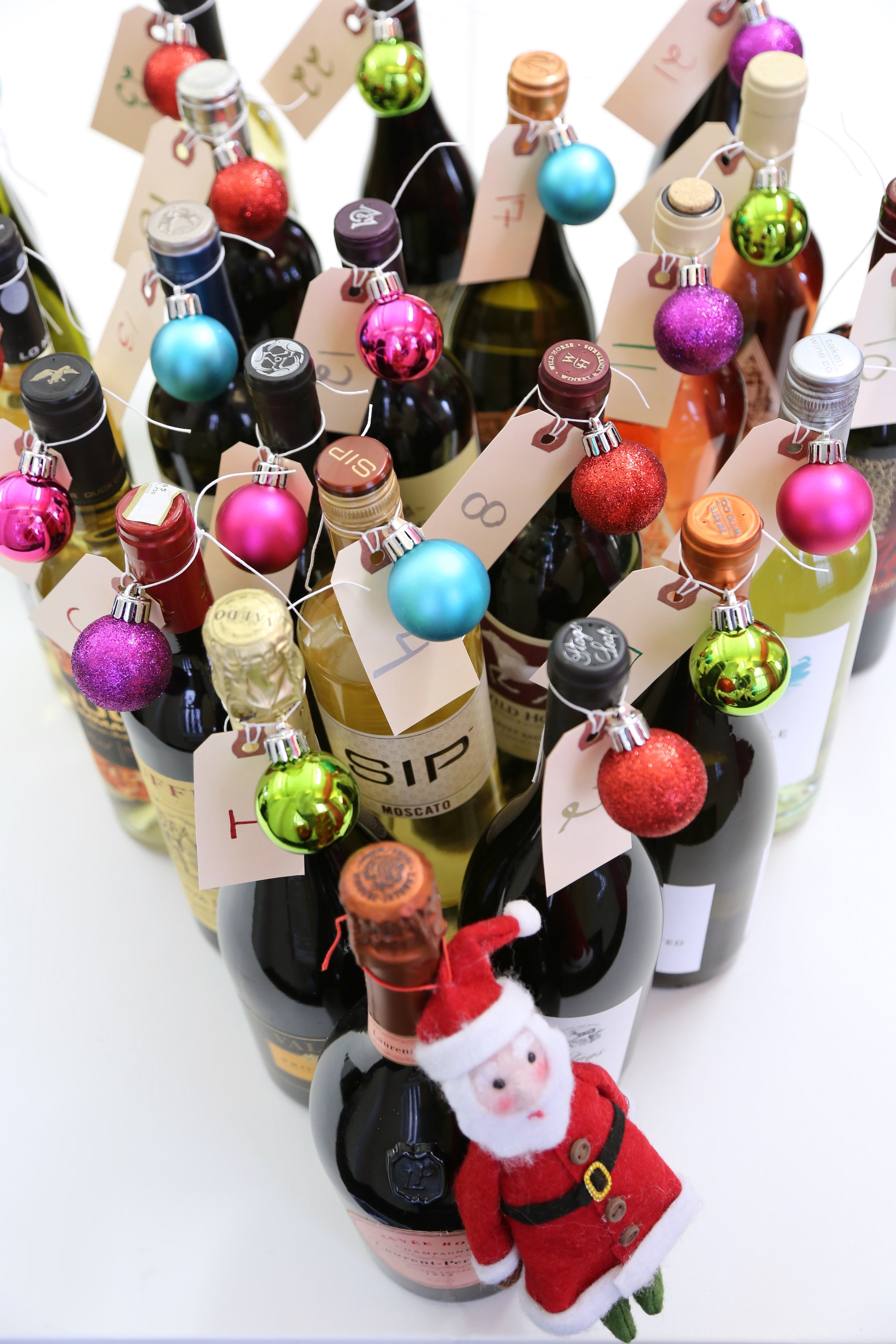 DIY wine bottle advent calendar (via www.popsugar.com)