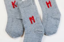 DIY knit grey stockings with monograms