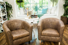 DIY faux leather chairs with nail trim