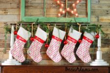DIY stocking holder with evergreens and ornaments