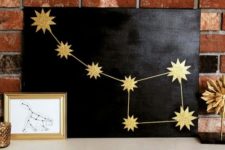 DIY black and gold constellation art piece