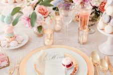 05 a cute galentine table setting with a macaron tower, plates and gilded touches