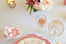 06 a cute tablescape in pink, cream and gold with pink blooms, striped plates and napkins and candies