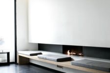 06 a modern ethanol fireplace, a comfy bench next to it bring a touch of luxury to the interior
