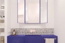 06 grey, black and white terrazzo on the floor and partly on the wall plus an ultra-violet vanity