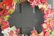 09 a wreath made of vintage Valentine’s Day cards looks retro