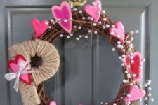 10 a grapevine wreath with pearls, bold pink hearts and a twine wrapped monogram