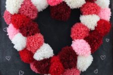 11 a colorful pompom heart in shades of red and pink can be easily DIYed