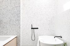 11 white and black terrazzo with little spots looks very contemporary and clean