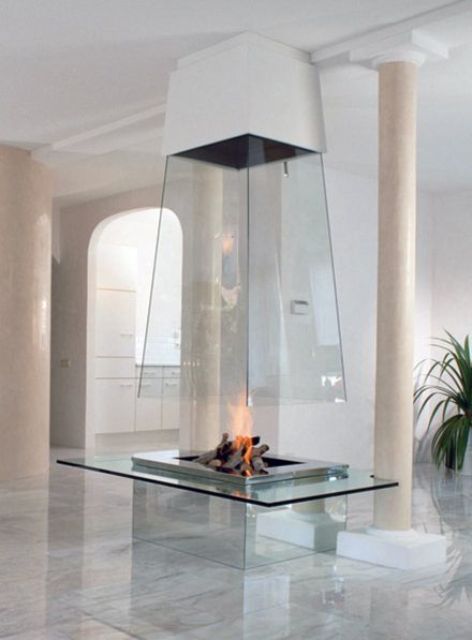 a spectacular ethanol fireplace with a glass hood is a great idea for an open layout