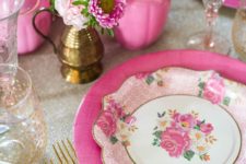 13 a vintage-inspired tablescape with bold pink touches and floral prints
