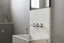 14 a white and grey terrazzo sink and a highlight along the wall