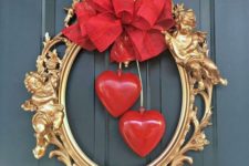 15 a refined gilded picture frame with red bows and hearts hanging is wow