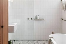 an elegant modern bathroom with vintage touches