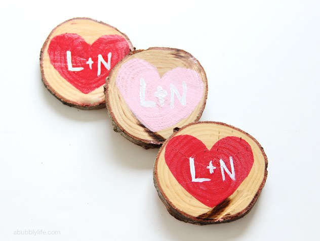 DIY wood slice heart coasters (via abubblylife.com)