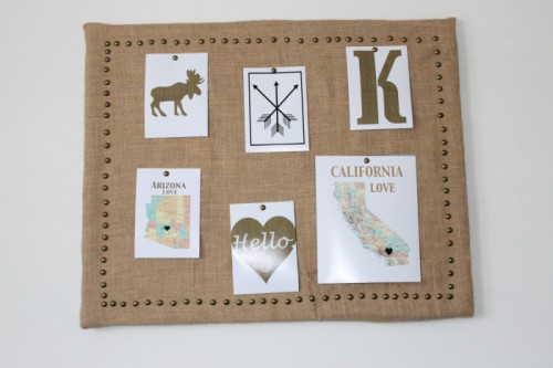DIY burlap pinboard with a brass pin frame (via www.shelterness.com)