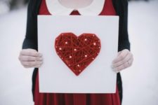 DIY string heart wall art with LEDs