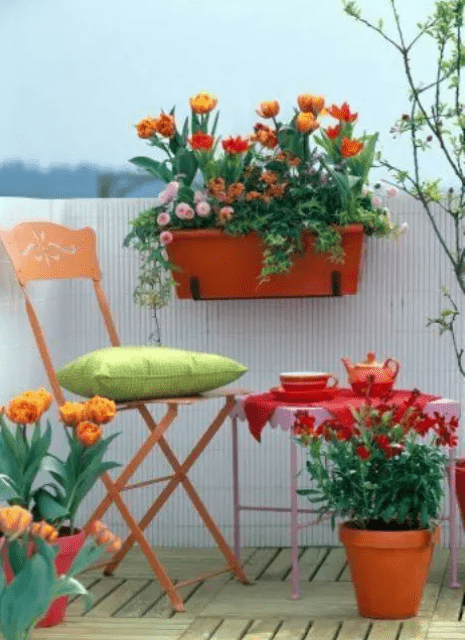 bright potted blooms and colorful furniture will turn your balcony in really a spring space