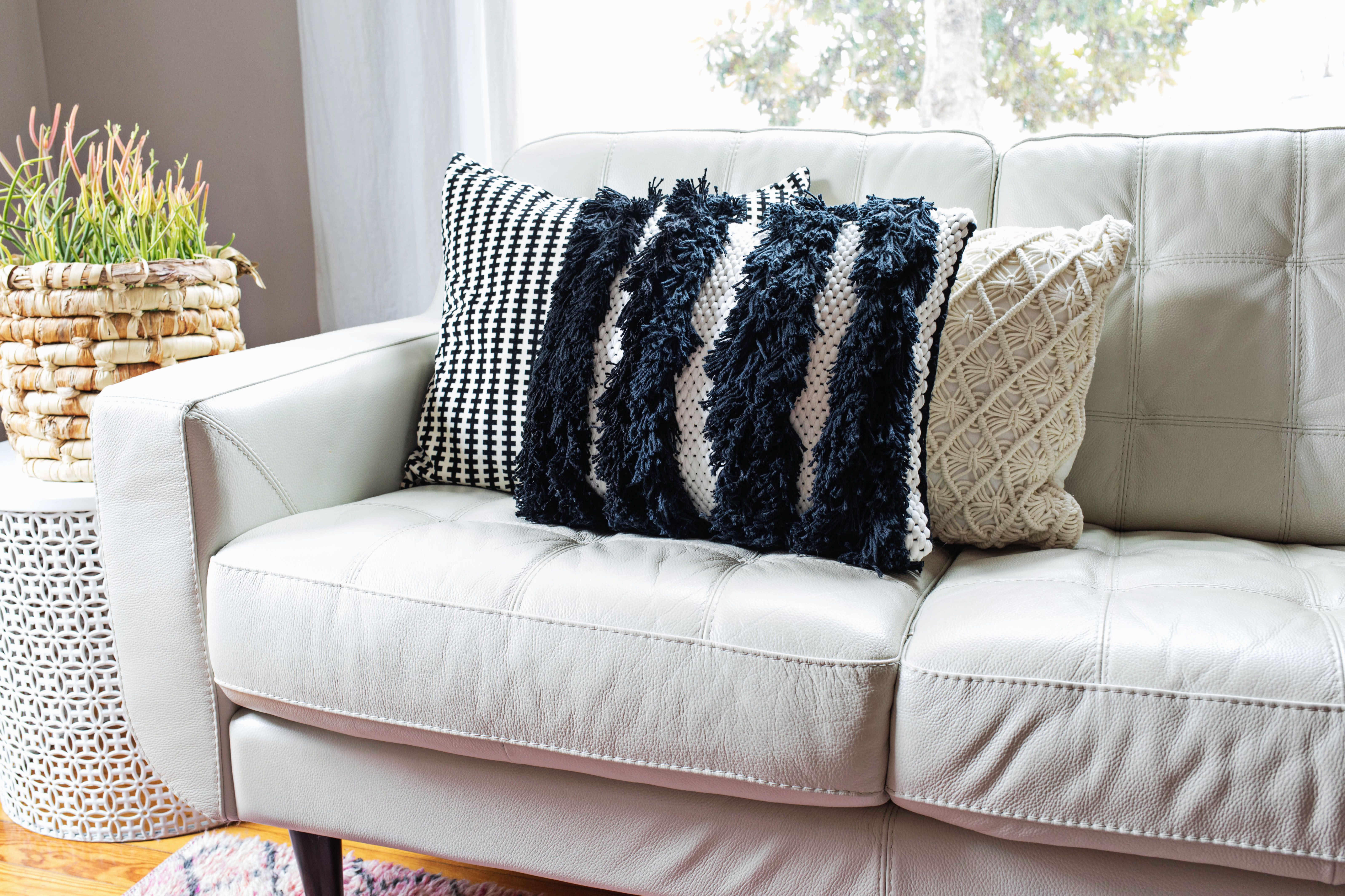 DIY black and white woven pillow with fringe