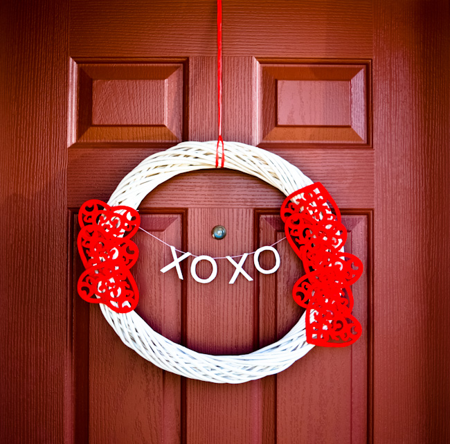 DIY white wreath with red laser cut hearts