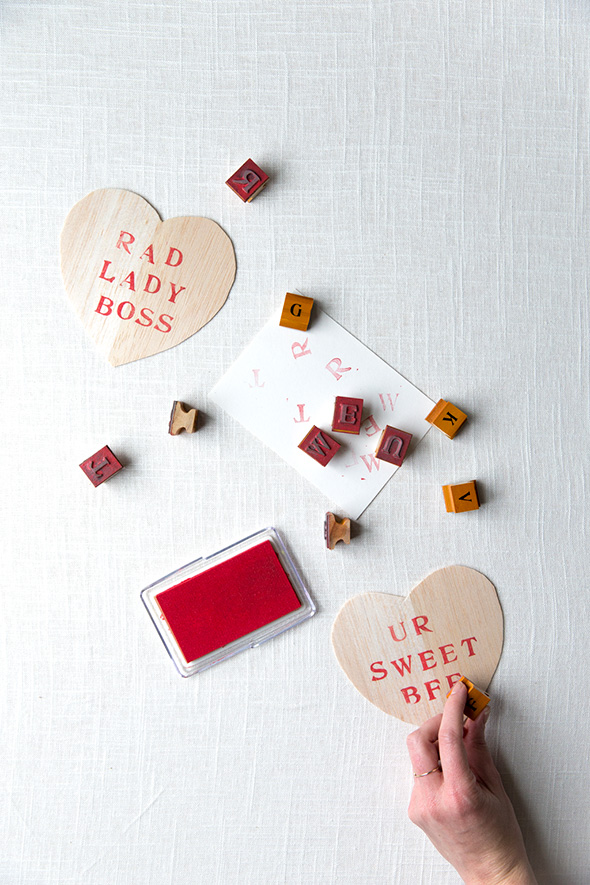 DIY balsa wood stamped gift tags (via sayyes.com)