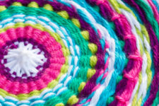 DIY super colorful wall hanging with an embroidery hoop