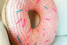 04 a crocheted confetti donut pillow with glazing