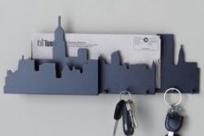 08 a city-shaped key rack with a mail holder and some small hooks for holding keys