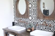 11 black and white patterned tiles on the sink wall are used for a cool accent