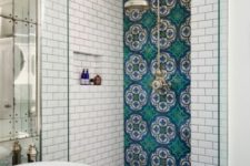 13 make your bathroom bright with blue and turquoise Moroccan tiles on one wall and floor