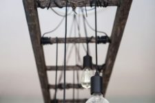 cool rustic-industrial looking chandelier you can DIY