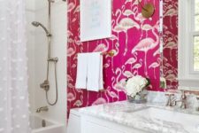 14 hot pink flamingo print wallpaper on one wall makes a bold statement